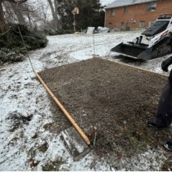 Placement by Mini Track Loader